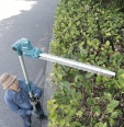 Foarfecă telescopică pentru gard viu cu acumulator Makita DUN461